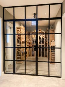 Stahl Meister Glastrennwand, Weinkeller, Drehtür, Wärmedämmung